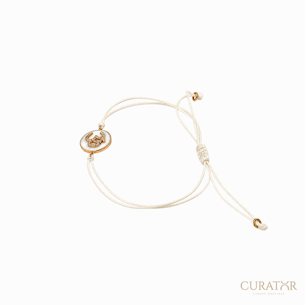 Anil Arjandas Jewels: Diamond Om Charm & Mother-of-Pearl Cream Cord Adjustable Bracelet