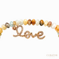 Anil Arjandas Jewels: Faceted Multi-Color Gemstone & Diamond "Love" Script Charm Bracelet