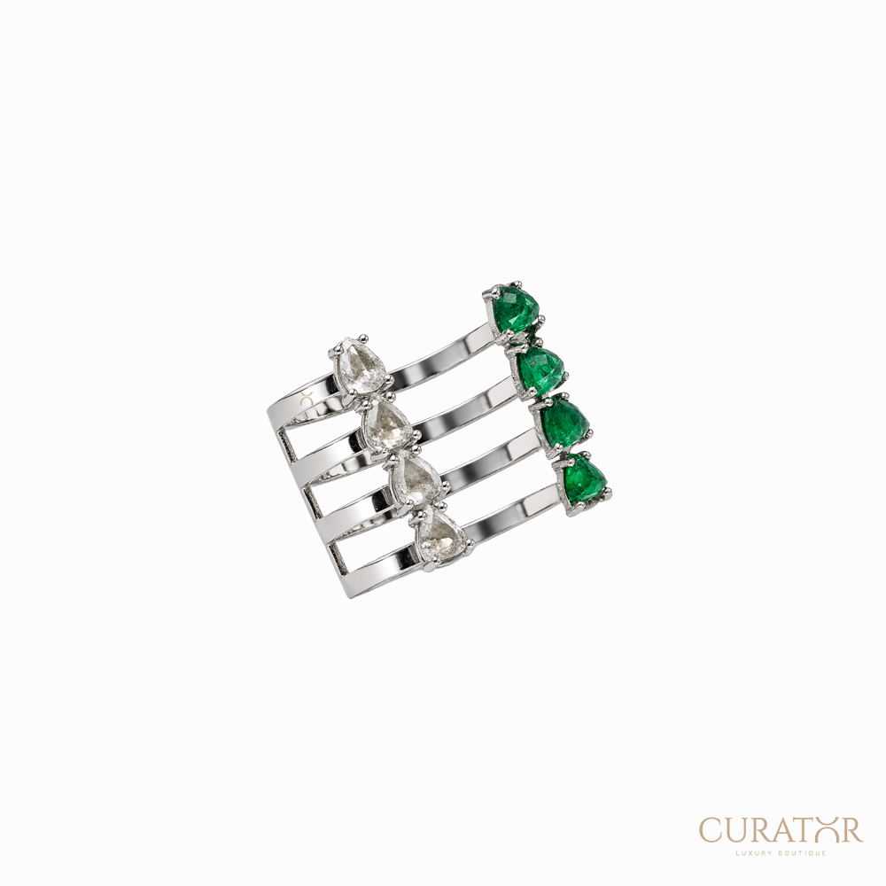 Anil Arjandas Jewels: 18K White Gold Four-Row Open Cage Ring with Pear-Cut Diamonds and Emeralds